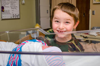 boy with sibling in hospital