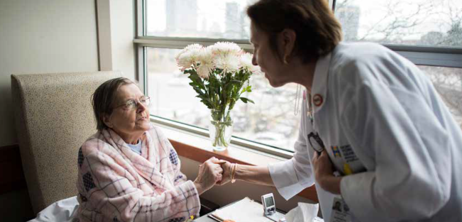Palliative care patient talking with doctor