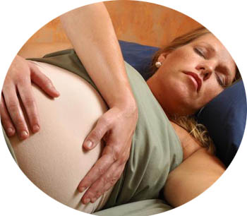 woman in labour receiving massage